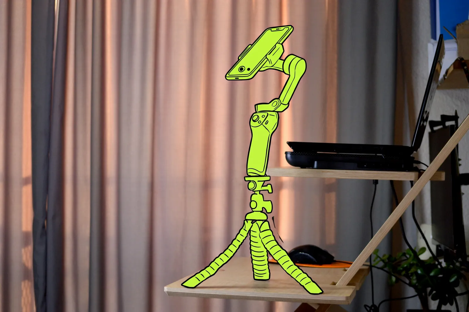 A phone on a gimbal and tripod set up to film content, the rig drawn in lime ink