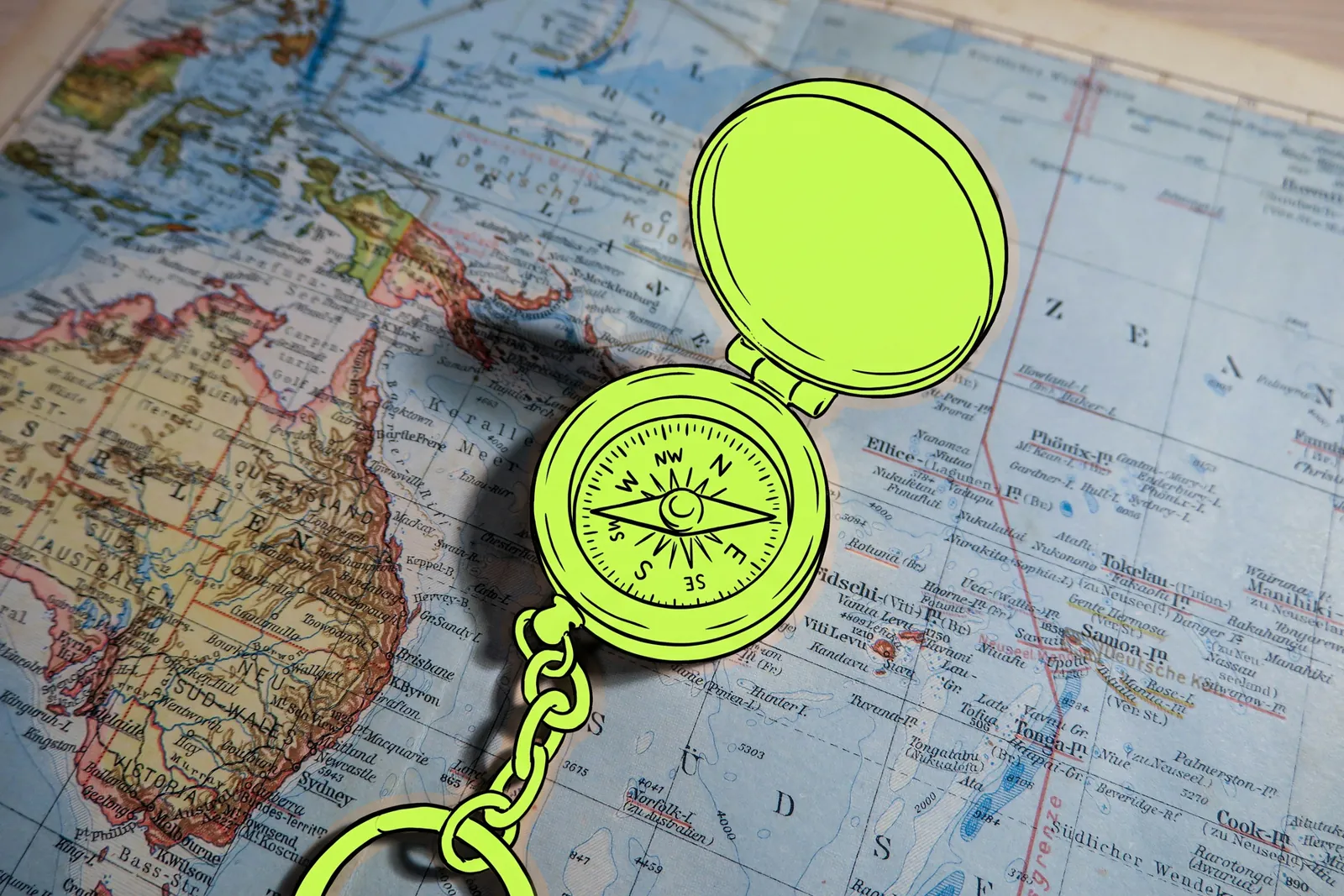 A compass on a map of Australia and Asia, the compass drawn in lime ink