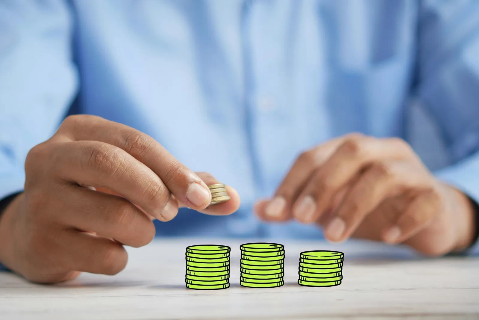 A hand adding a coin to stacks of coins on a desk, the stacks drawn in lime ink